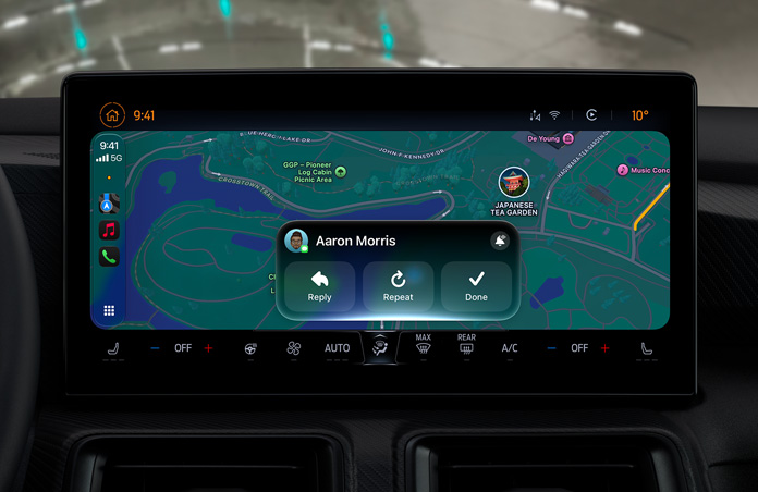 A CarPlay screen showing a Messages notification, with Maps visible in the background