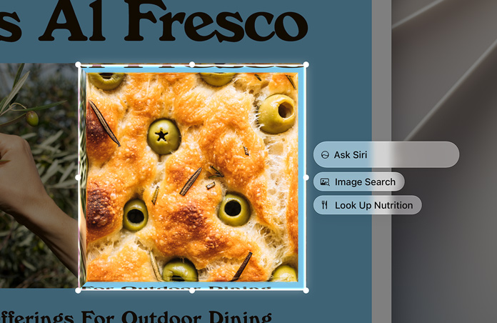 Po prawej stronie wyróżnionego obrazu oliwek zapieczonych w focaccii pojawiają się pola Inteligencji wizualnej: Ask Siri, Image Search, Look Up Nutrition